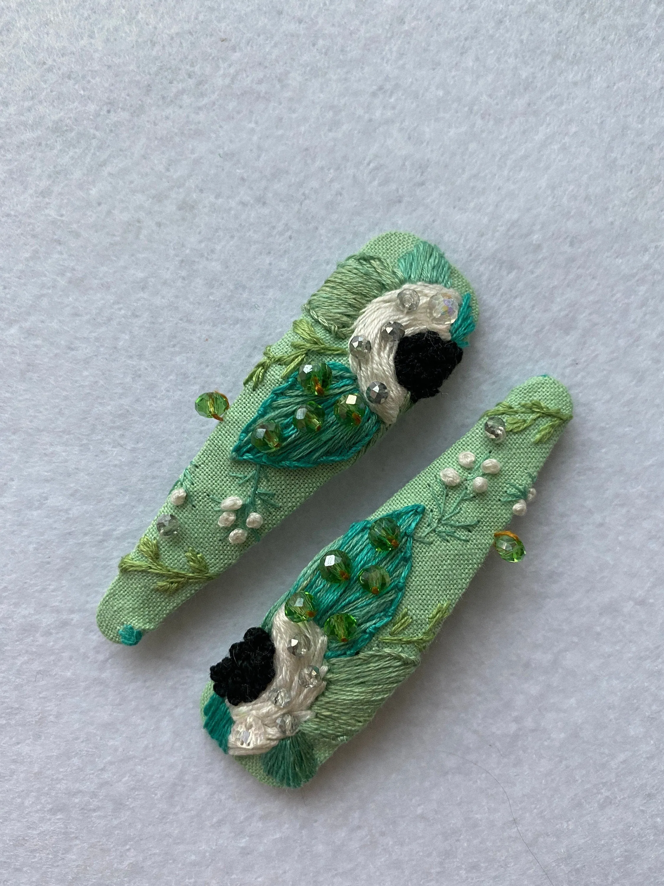 Mint embroidered hair clip set